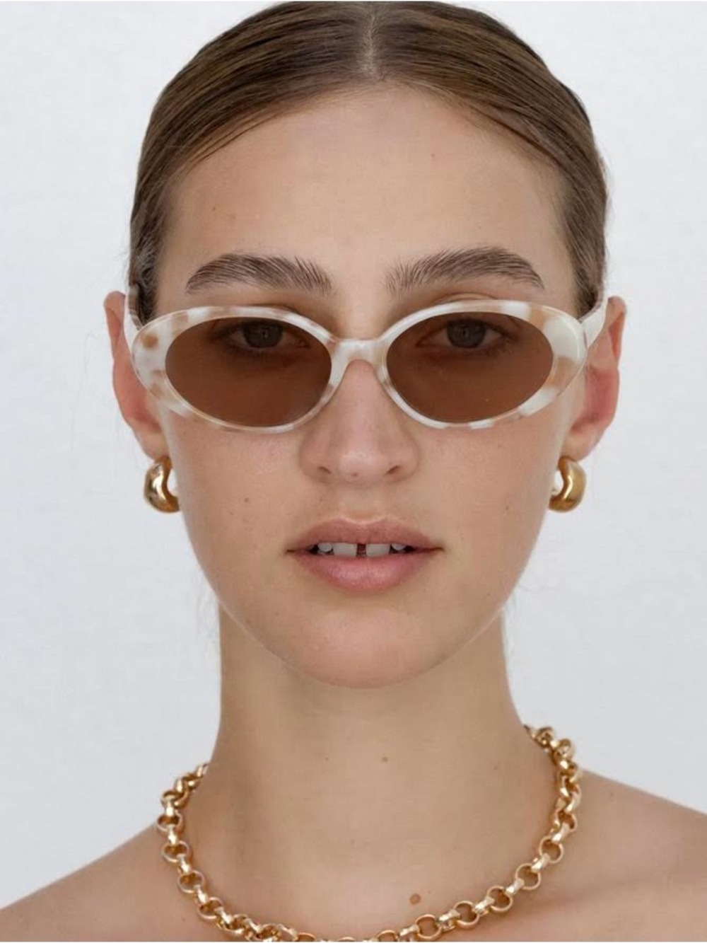 Women’s Cream Tortoiseshell Oval Sunglasses with Brown Lenses